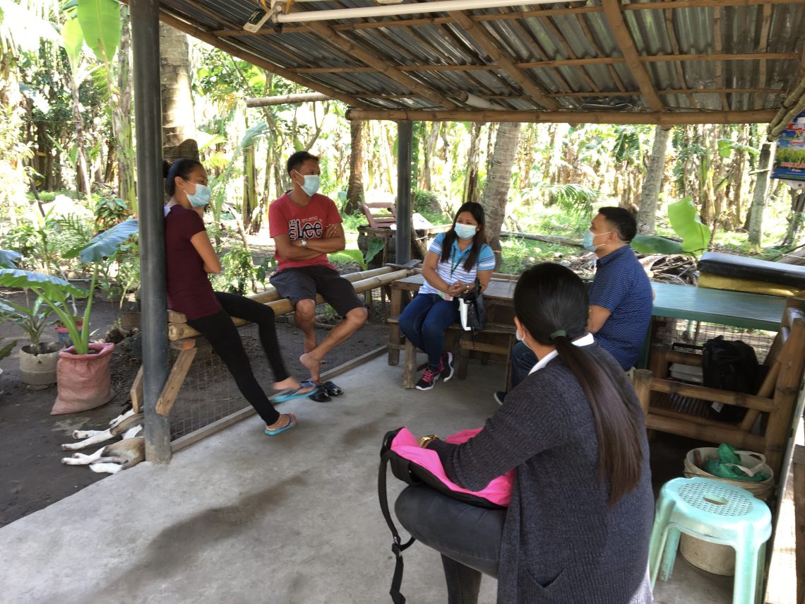 Local F2F partner AJ Rodriguez meets in an open-air structure with ASHI members.