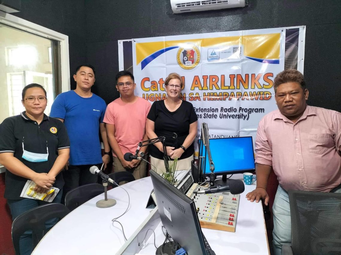 Ronan and a group of cooperative employees in the Philippines