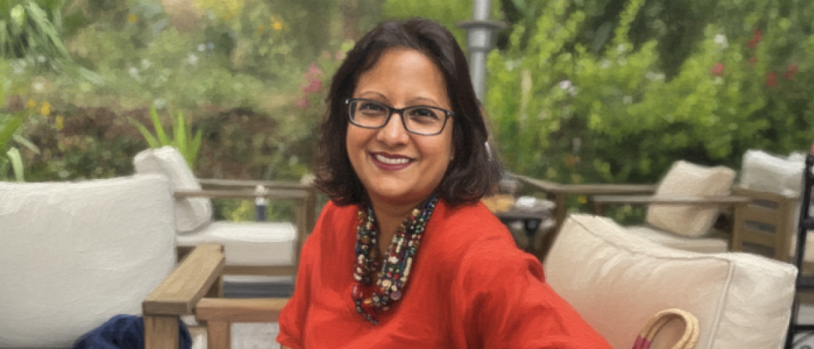 Image of Grameen Foundation President and CEO, Sabrina Quaraishi, sitting outside