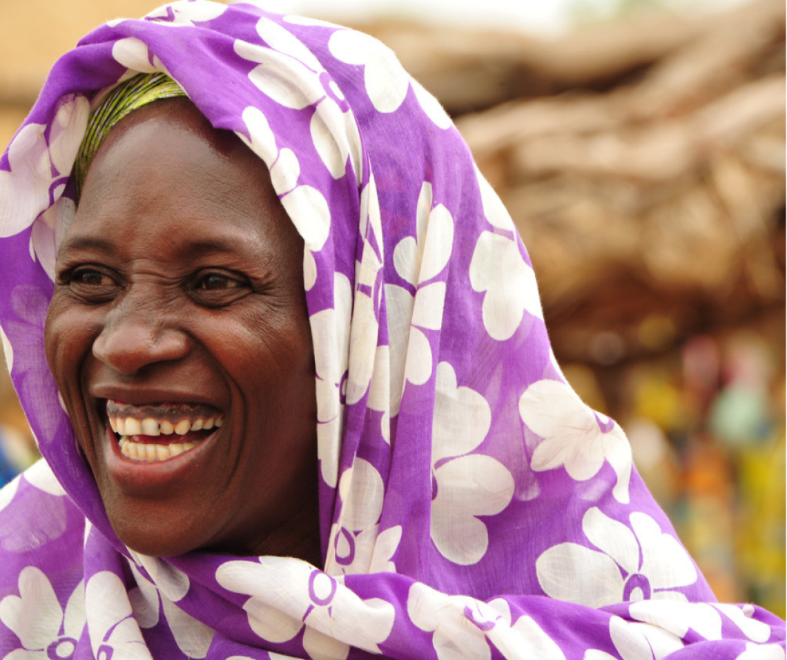 Woman In Purple Scarf Invest HER Image