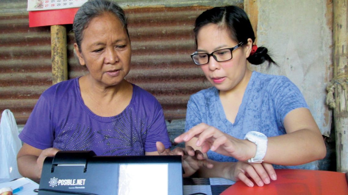 Philippine Community Network Agent doing transaction for customer