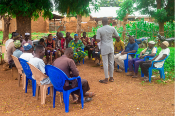 Man leading group for 10 Spark Workshop
