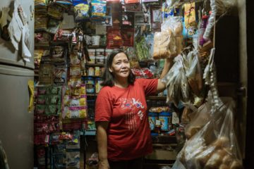 Madrigal, a beneficiary from the Philippines, at her shop.