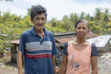 A couple in the Philippines, who own and manage a coconut farm.