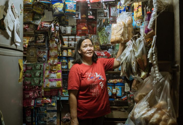 Madrigal, a beneficiary from the Philippines, at her shop.