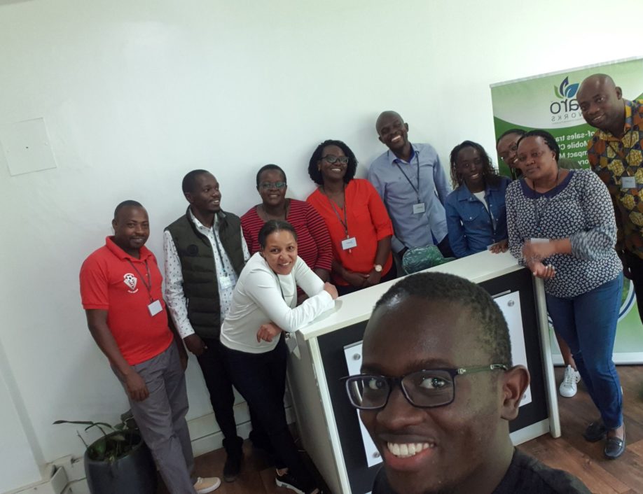participants in the Exploring Power Dynamics Workshop taking a group selfie after the workshop ended