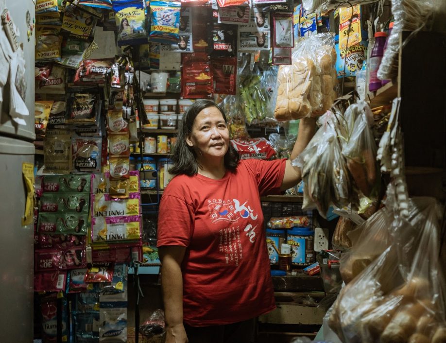 Madrigal, a beneficiary from the Philippines, at her shop.